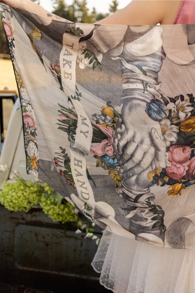 bamboo floral scarf with humming birds and clasped hands