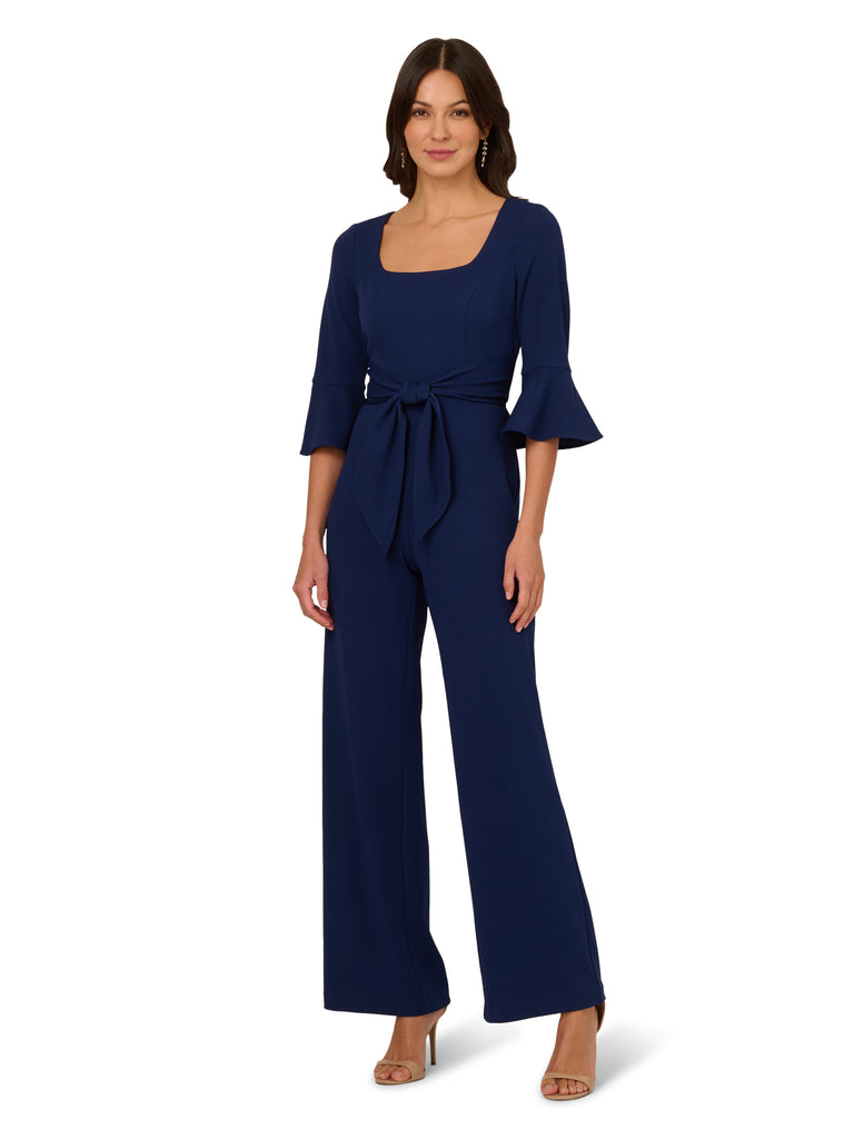 square neck bell sleeve tie front navy jumpsuit